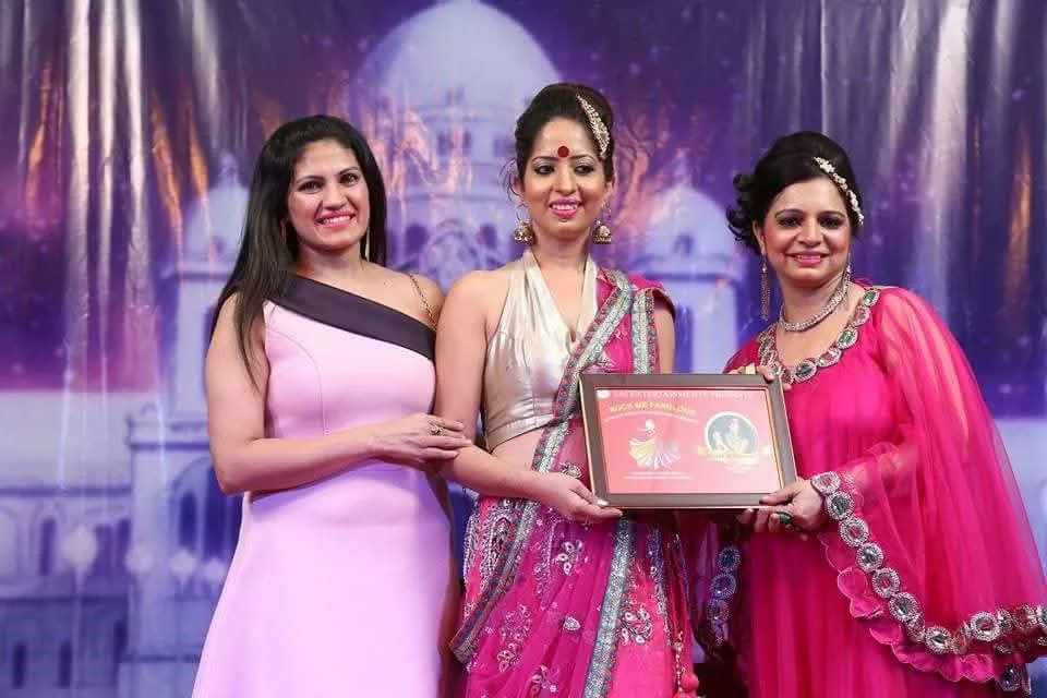 Roli Tripathi being honoured at an awards ceremony